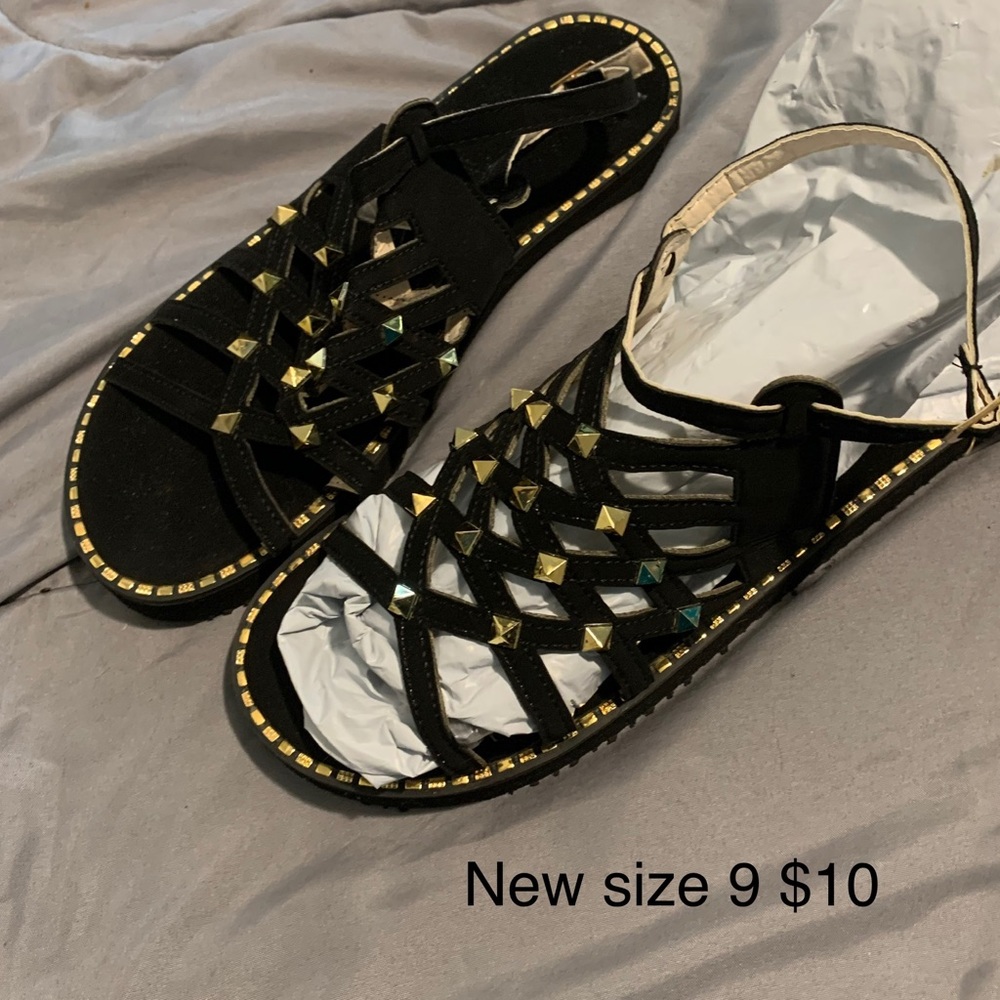 Black sandals with gold stones